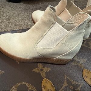 Sorel Cream Ankle Boots with Slip-On Style and Comfortable Fit